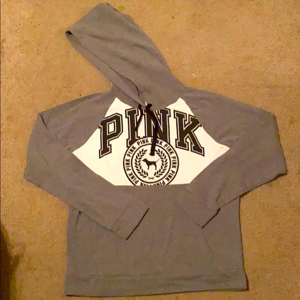 i’m selling a grey pink sweatshirt